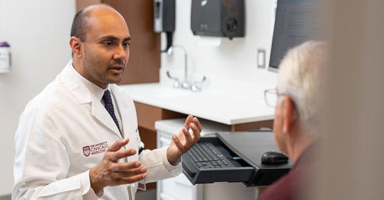 Nishant Agrawal, MD, and patient