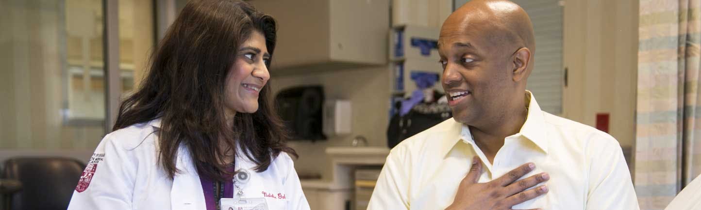 Sonali Smith, MD, and Clayton Harris, lymphoma patient