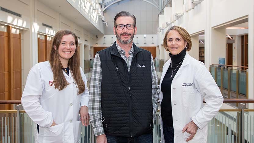 Patient John Polo with oncologist Christine Bestvina, MD, left, and surgeon Jessica Donington, MD.