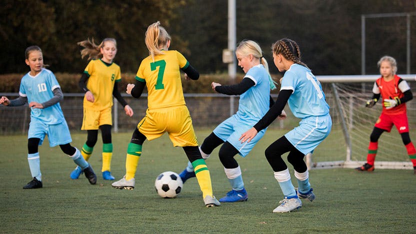 Image of girls playing soccer