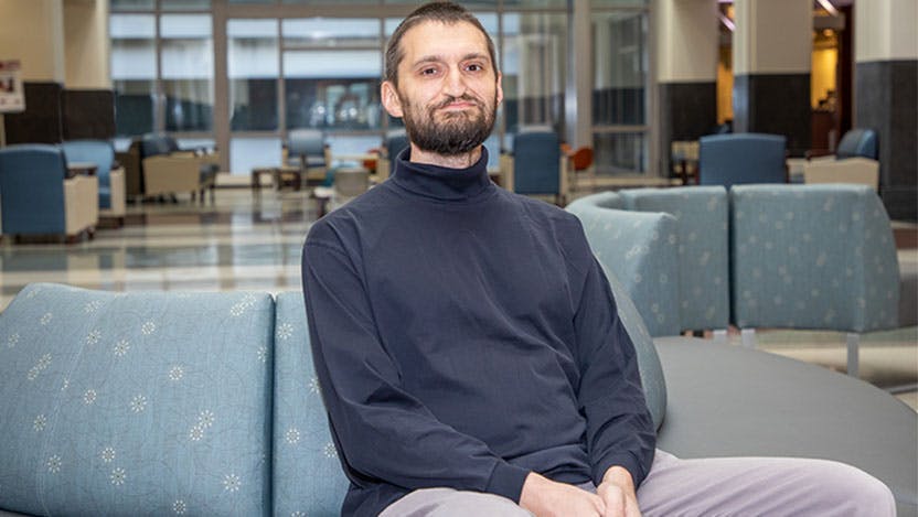 Dmitry Karpeyev, PhD, survived a dangerous cancerous tumor behind his face; now he's using his computer science expertise to help study cancer. 