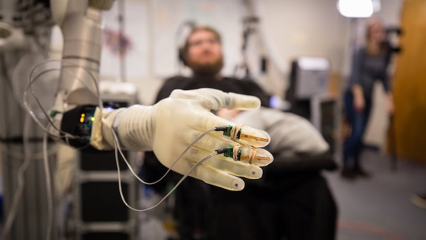 Patient with robotic hand