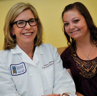 Tara Henderson, MD, director of the Childhood Cancer Survivors Clinic and her patient, Elisabeth Noreen