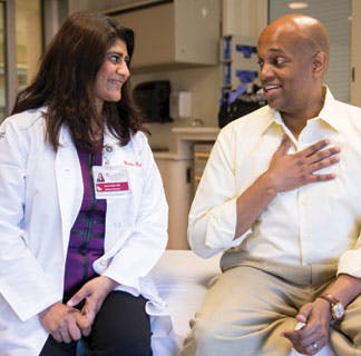 Medical oncologist Sonali Smith, MD, and lymphoma patient Clayton Harris